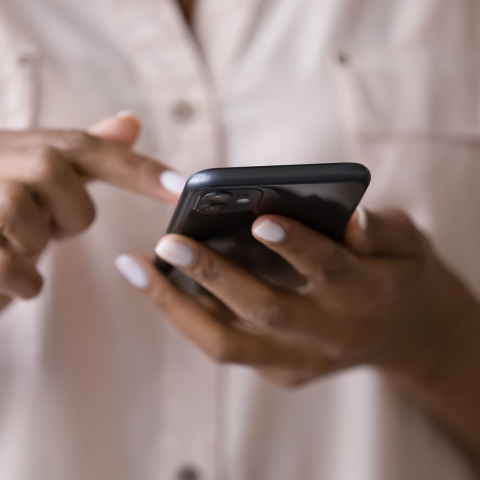 Two hands holding a cellphone