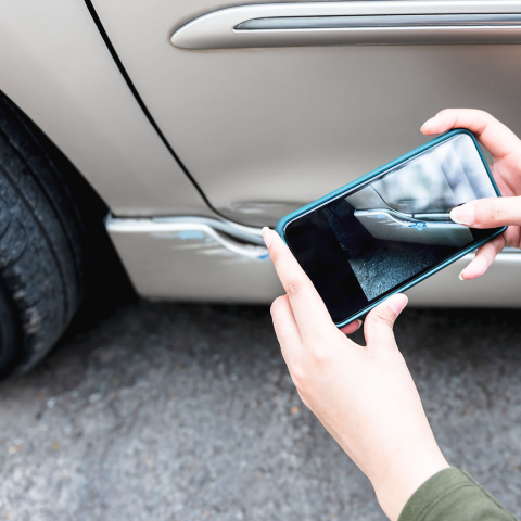 Taking a photo of vehicle damage with a cellphone