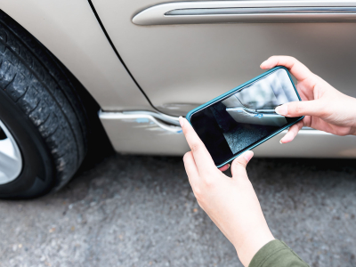 Taking a photo of vehicle damage with a cellphone
