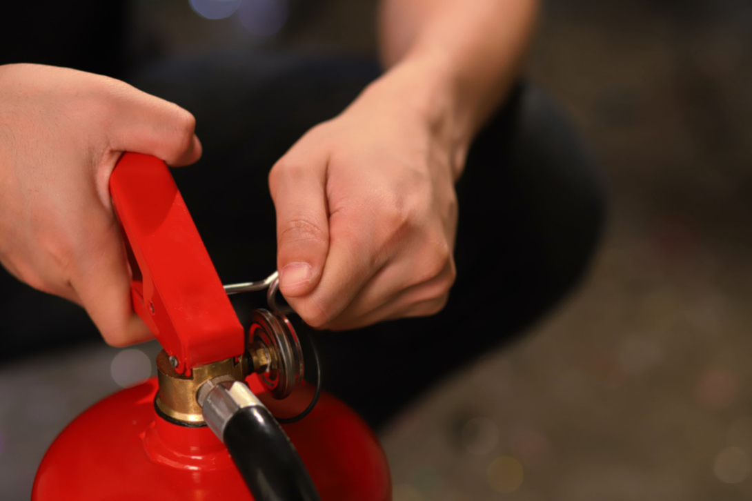 A red fire extinguisher