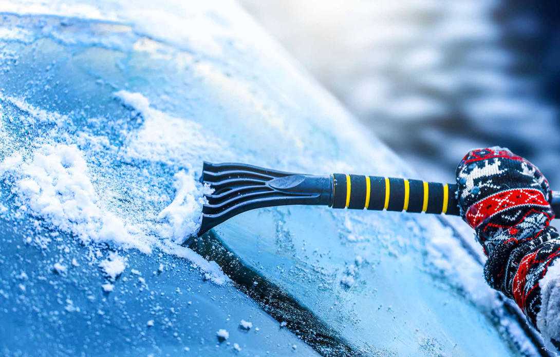 Scraping a windshield