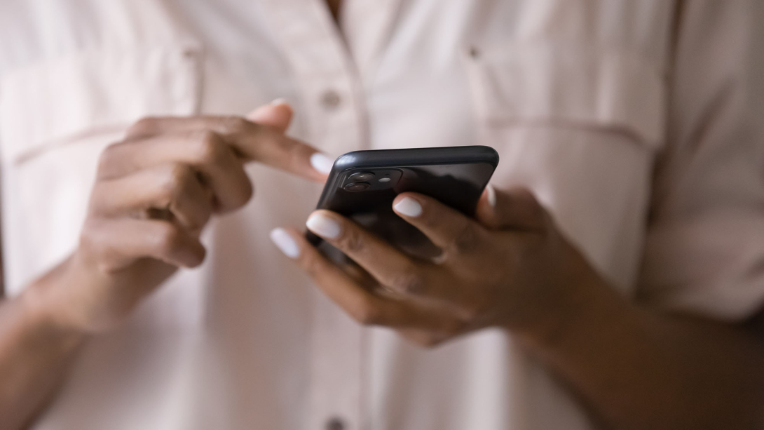 Two hands holding a cellphone