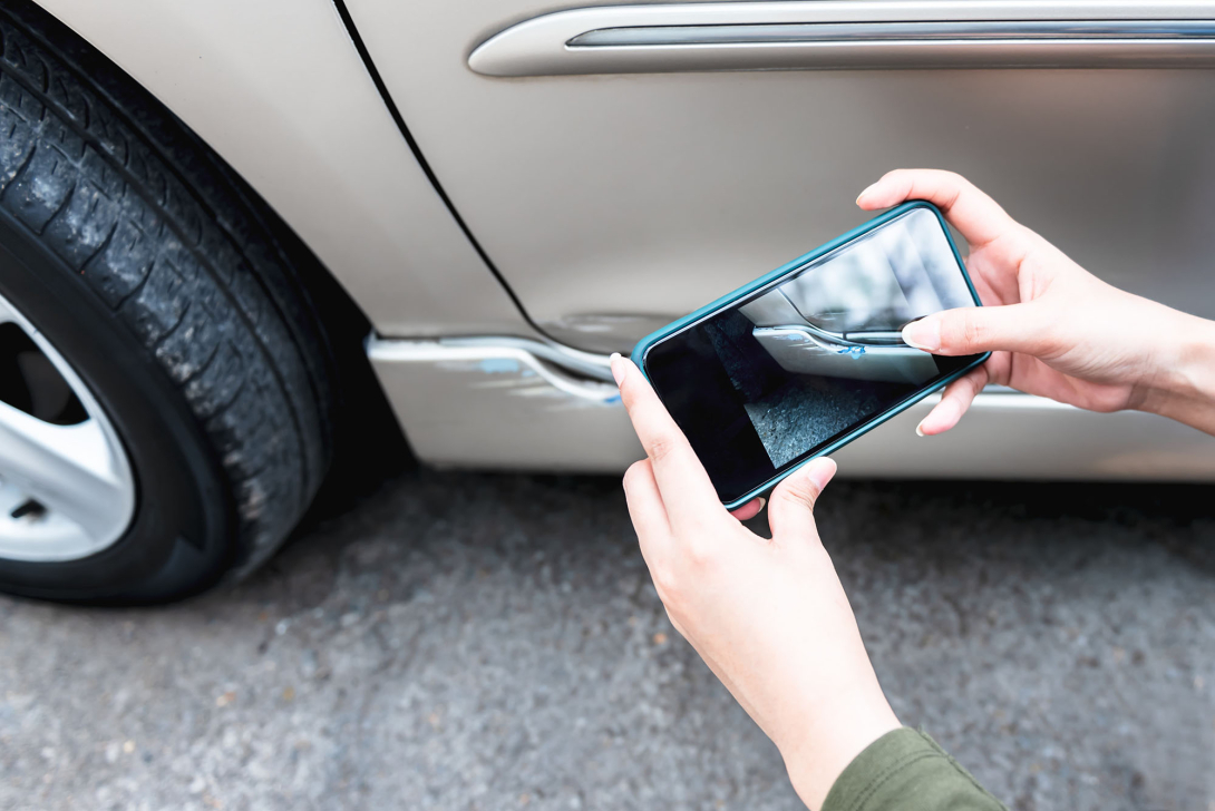 Taking a photo of vehicle damage with a cellphone